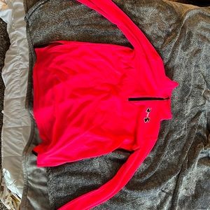 The color is hot pink the size is youth large and the brand is under armor